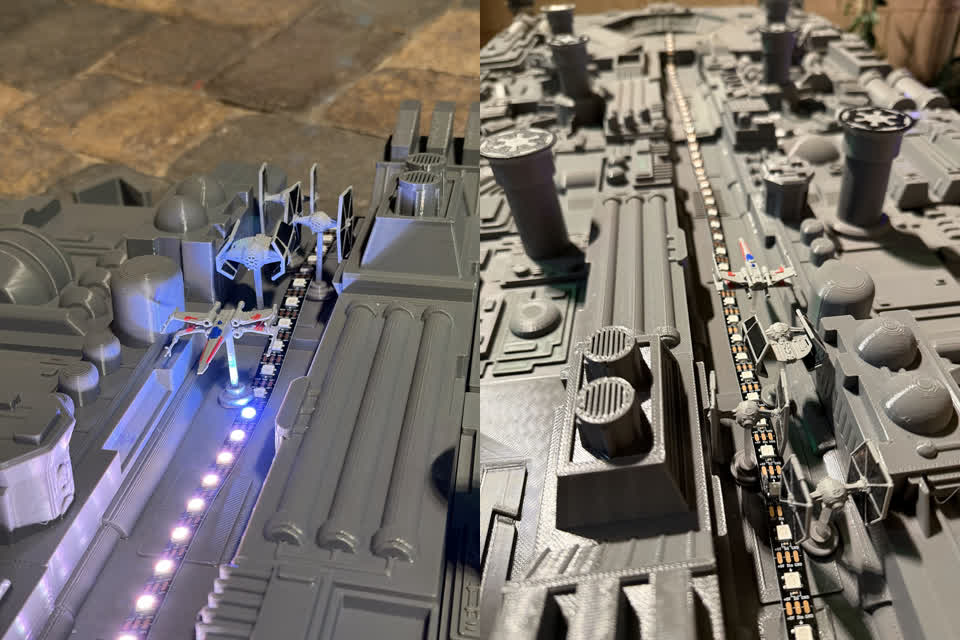 The finished trench run cornhole board with fighter ships at the start of the trench
